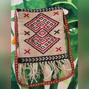 Vintage woven shoulder bag or pouch featuring a traditional geometric